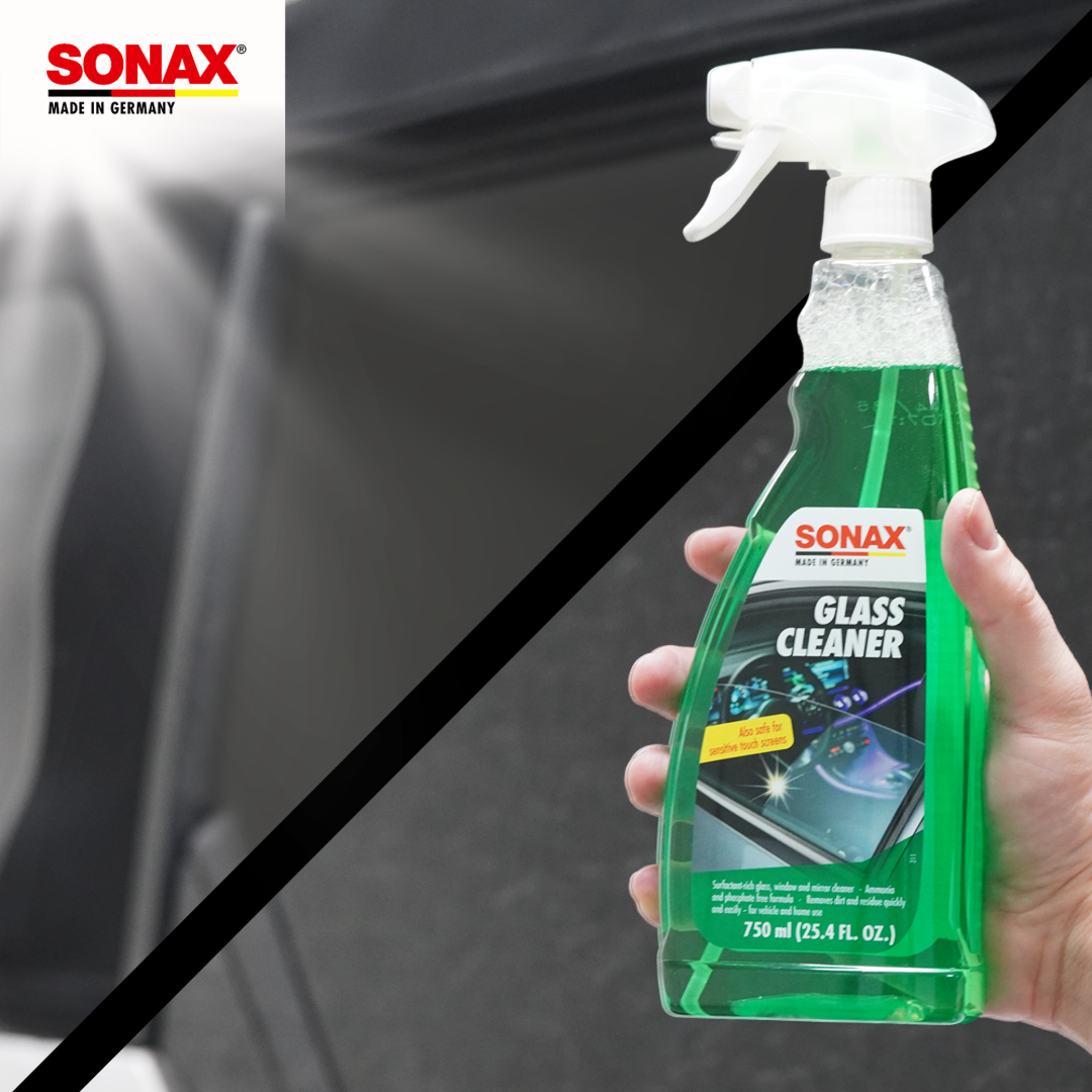 SONAX Glass Cleaner in use on a car window